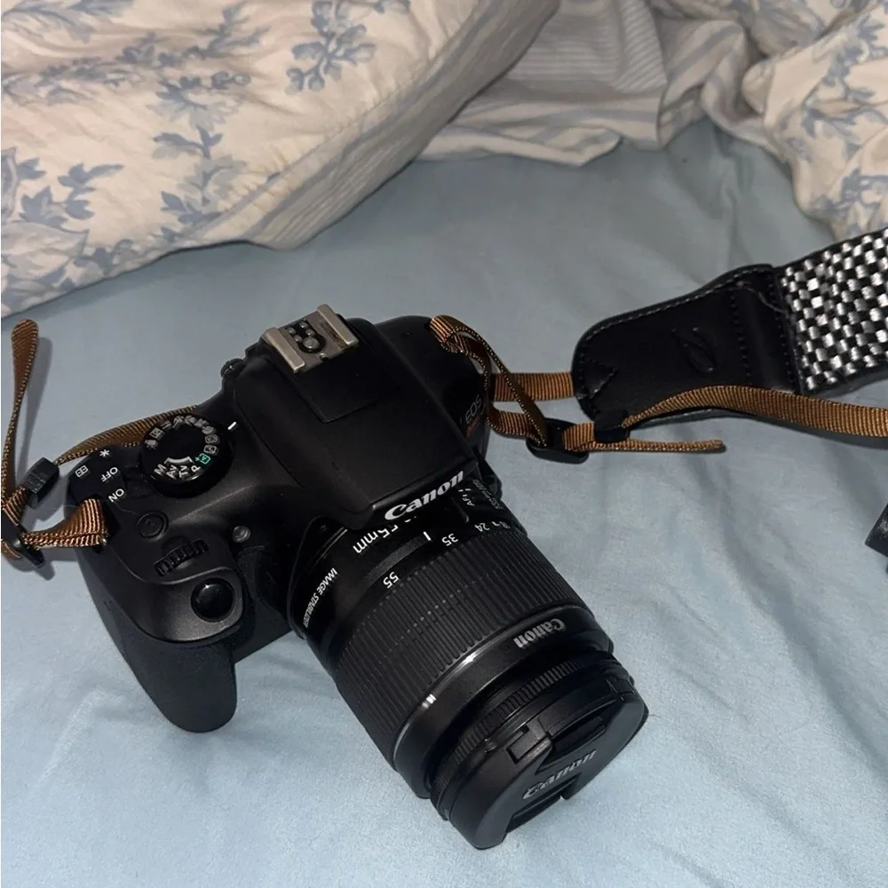 Canon Black DSLR with Brown Strap